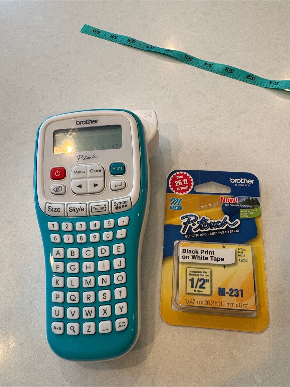 Brother P-touch Handheld Label Maker in Teal and White